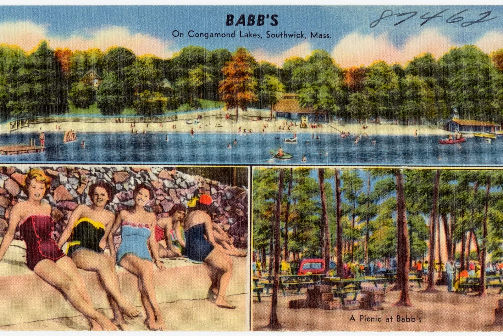 A vintage linen-textured color postcard captioned 'Babb's, on Congamond Lakes, Southwick, Mass.' showing a long single-story white amusement-and-resort pavilion stretched along the wooded shore of one of the Congamond ponds in summer, with a row of tall casement windows under a dark hipped roof, a covered front porch with white pillars, two flagpoles flying the Stars and Stripes at either end, dense green deciduous trees behind and to the right, a low stone-and-rail seawall along the lakefront, the calm lake water in the foreground reflecting the building, and a clear blue mid-summer sky overhead.